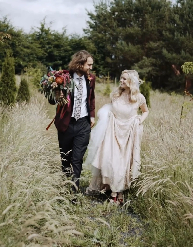 Bride and groom walking in Mount Druid gardens