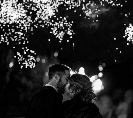 Bride and Groom kiss under fireworks at Kilkea Castle