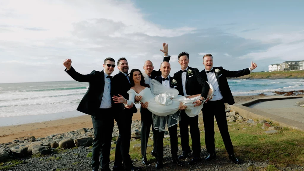 Wedding party with Bride and Groom on Spanish Point beach