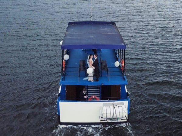 wedding couple filmed on a boat